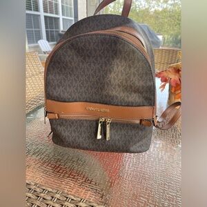 Brown Michael Kors back pack.